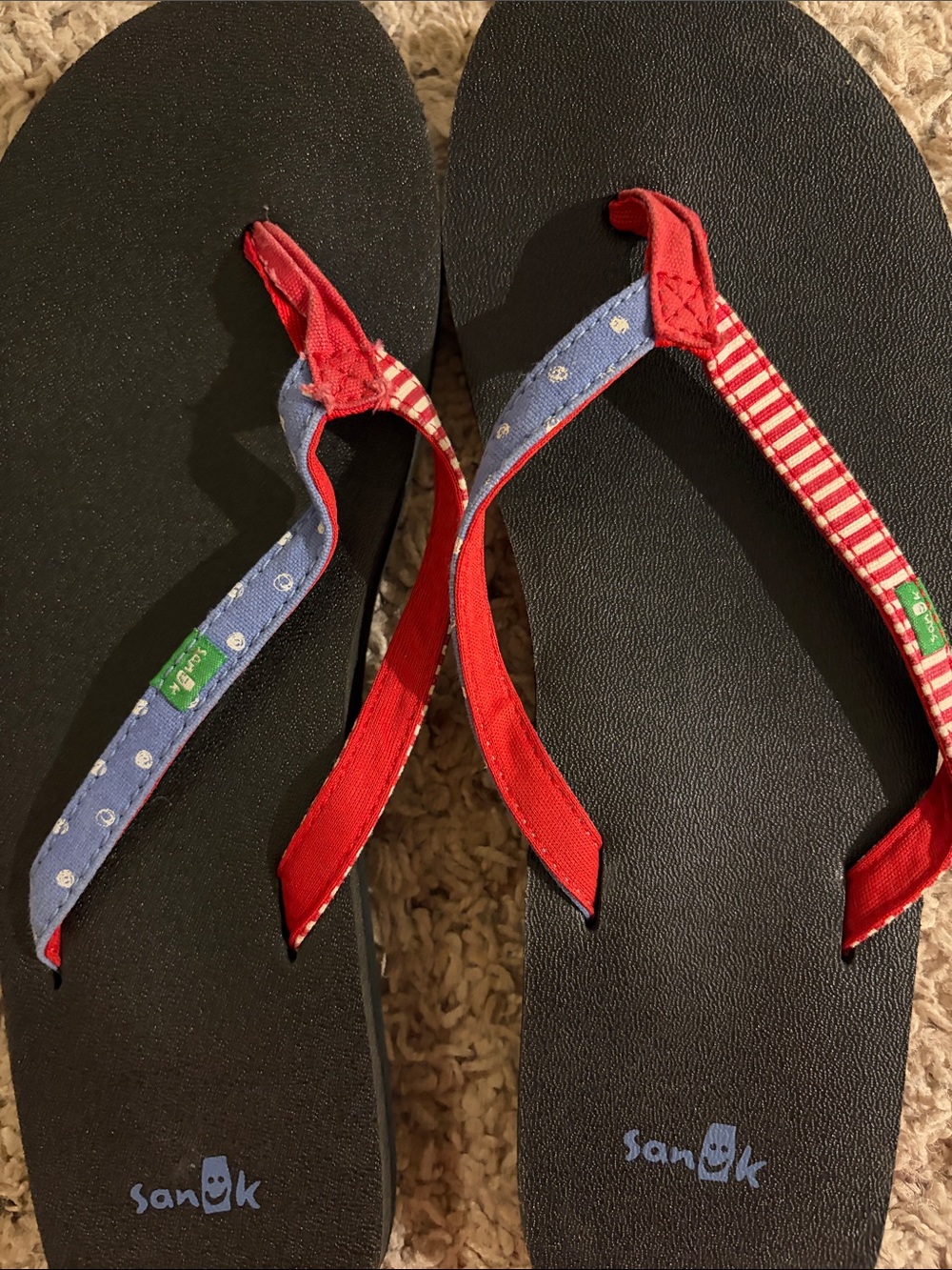 Sanuk Black Flip Flops with Red and Blue Patterned Straps - Picture 3 of 3